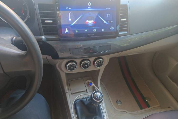 Used Mitsubishi Lancer EX 2012 Chasing Edition 1.8L Manual Luxury Model Audio And AC Panel