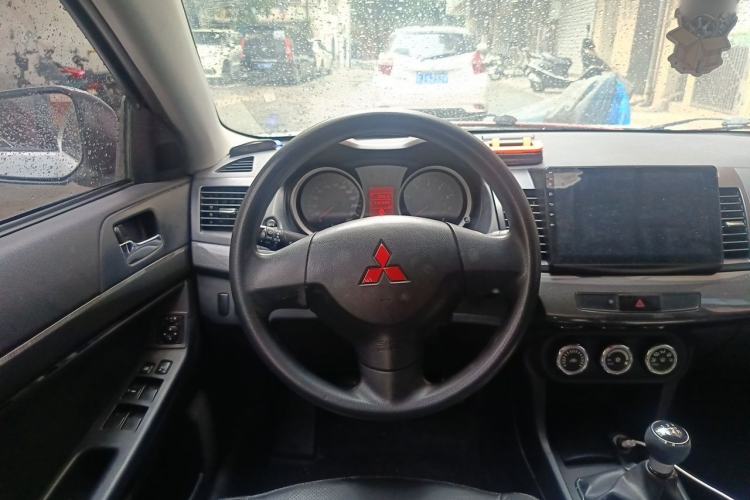 Used Mitsubishi Lancer EX 2012 Xinyuan Edition 2.0L Manual Comfort Model Steering Wheel