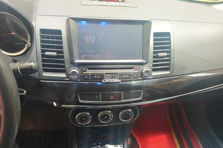 Used Mitsubishi Lancer EX 2013 Style Edition 1.6L Manual Luxury Model Audio And AC Panel