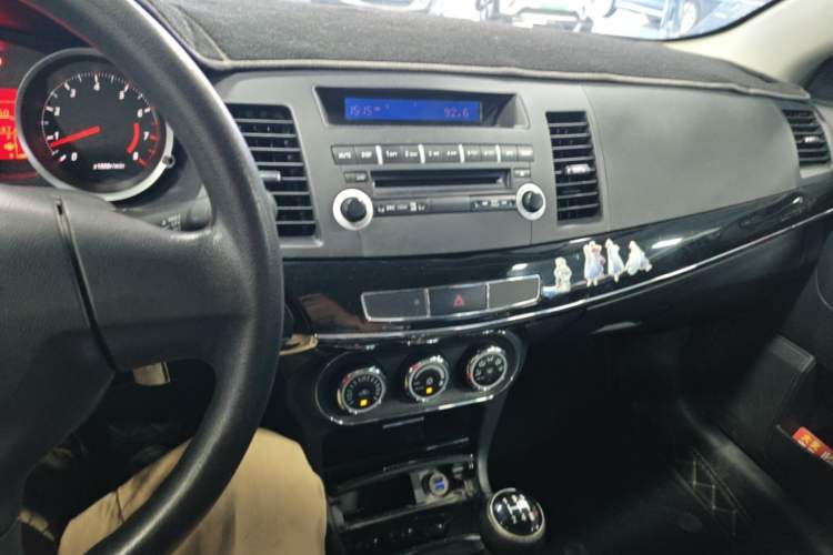 Used Mitsubishi Lancer EX 2013 Chasing Edition 1.8L Manual Luxury Model Audio And AC Panel