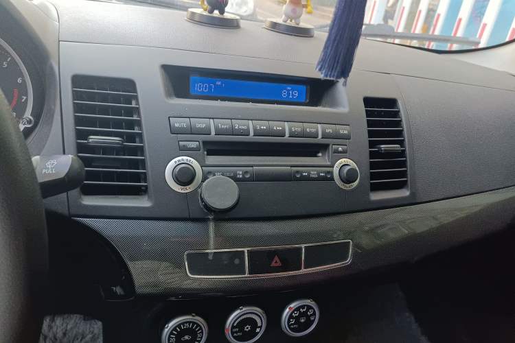 Used Mitsubishi Lancer EX 2013 Style Edition 1.6L Manual Classic Model Audio And AC Panel