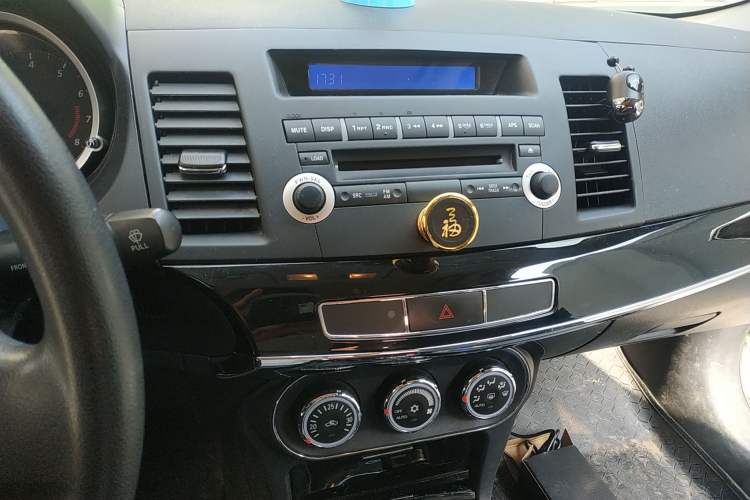 Used Mitsubishi Lancer EX 2013 Style Edition 1.6L Manual Luxury Model Audio And AC Panel
