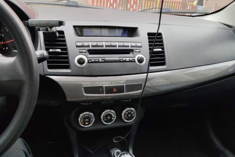 Used Mitsubishi Lancer EX 2013 Fashion Edition 1.8L Manual Comfort Version Audio And AC Panel