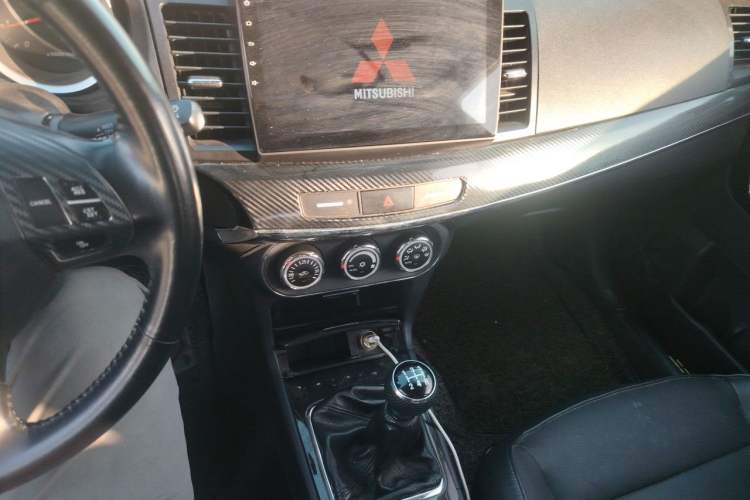 Used Mitsubishi Lancer EX 2013 Chasing Edition 1.8L Manual Luxury Model Audio And AC Panel