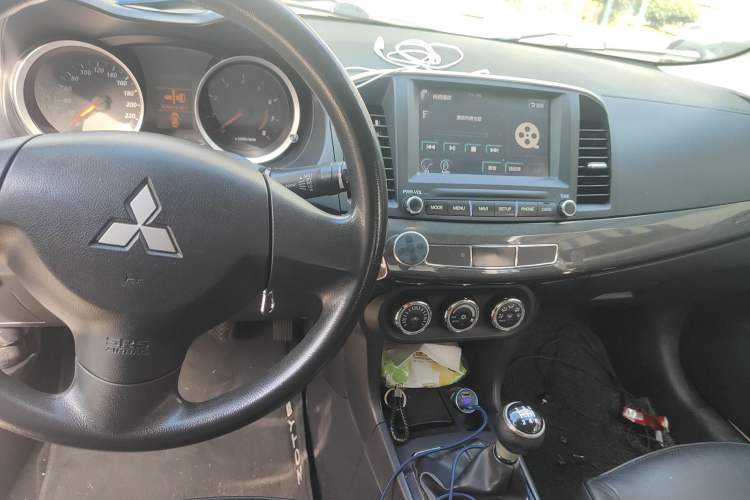 Used Mitsubishi Lancer EX 2013 Fashion Edition 1.8L Manual Comfort Version Audio And AC Panel