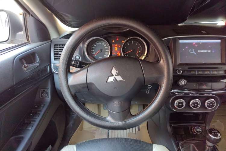 Used Mitsubishi Lancer EX 2013 Chasing Edition 1.8L Manual Luxury Model Steering Wheel