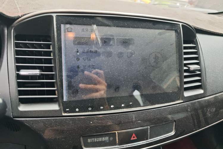 Used Mitsubishi Lancer EX 2015 1.8L CVT ZhiShang Edition China IV Standard Audio And AC Panel