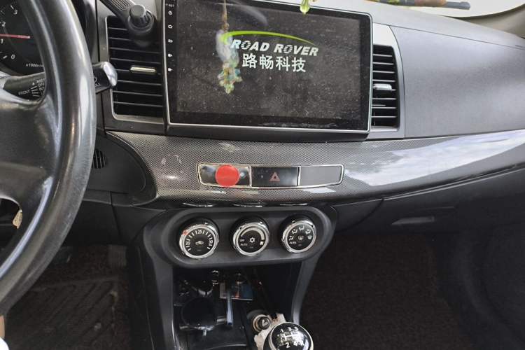 Used Mitsubishi Lancer Fortis 2013 1.8L Manual Comfort Model China IV Standard Audio And AC Panel