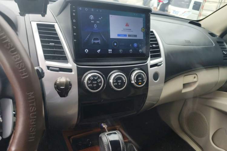 Used Mitsubishi Pajero Sport 2011 3.0L Sport Navigation Edition Audio And AC Panel