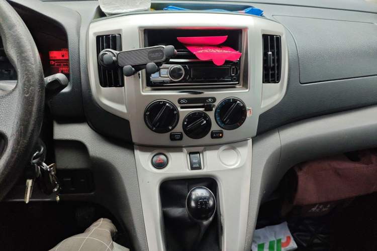Used Nissan NV200 2012 1.6L 232 Seats Luxury Version Audio And AC Panel