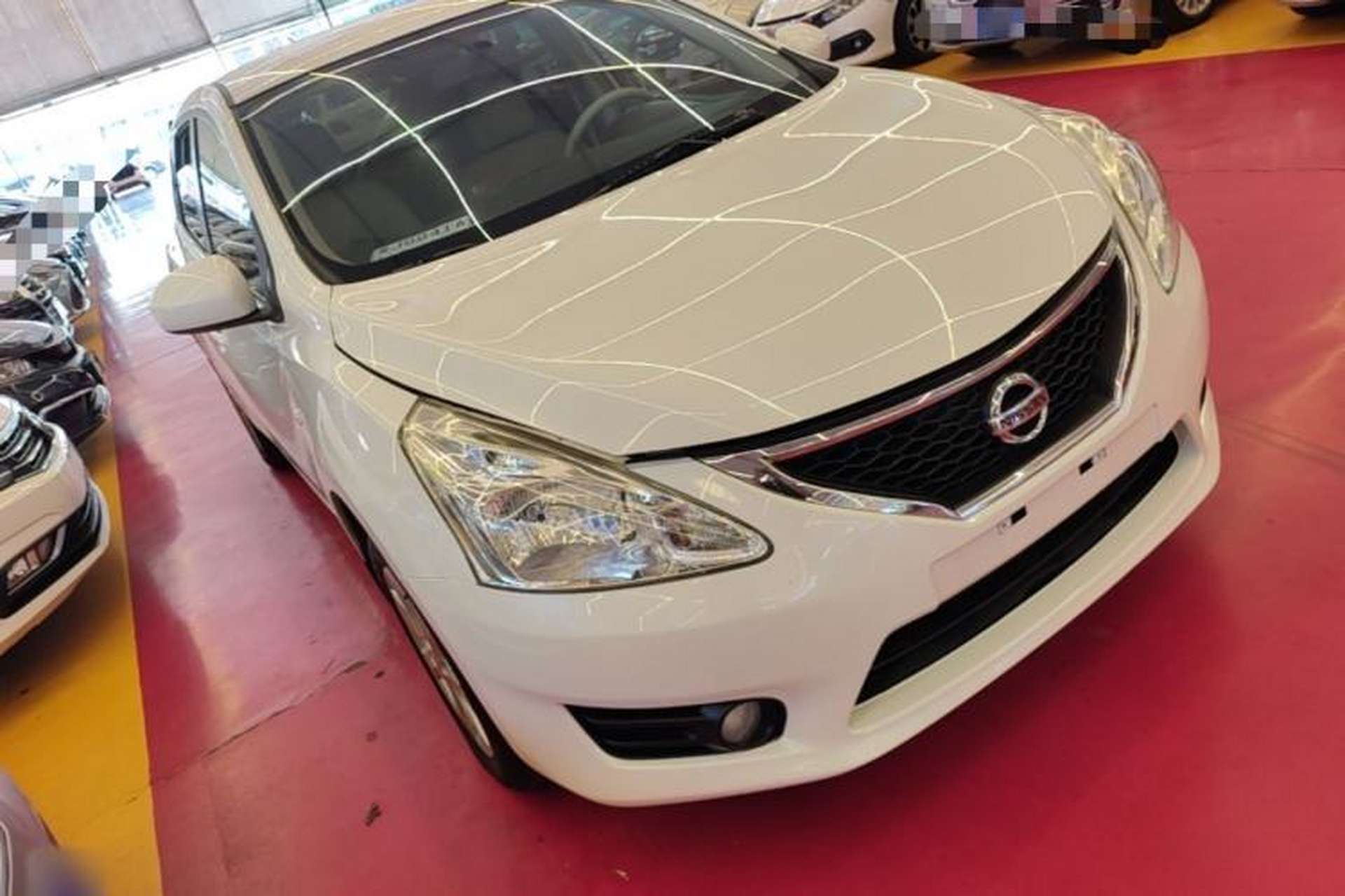 Used Nissan Tiida 2011 1.6L CVT Comfort Model Front Right 45 Deg