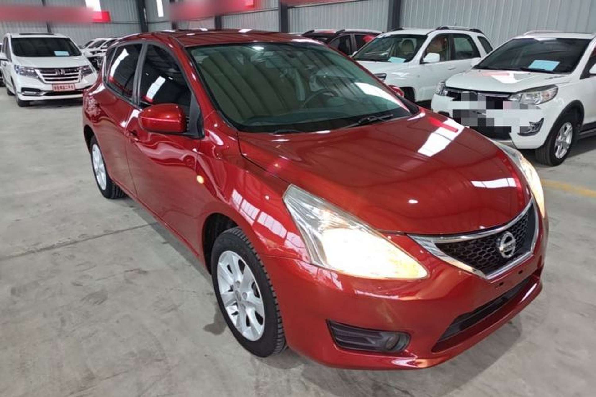 Used Nissan Tiida 2014 1.6L CVT Comfort Model Front Right 45 Deg