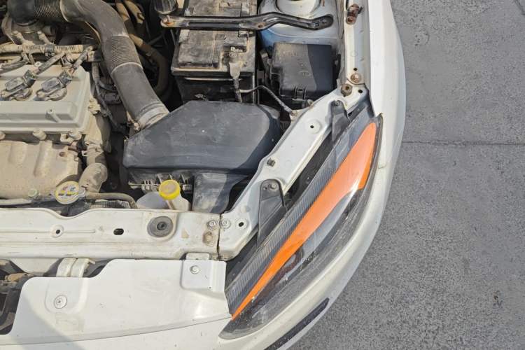 Used Oley 2012 Sedan 1.5L Manual Comfort Model Engine Bay Left
