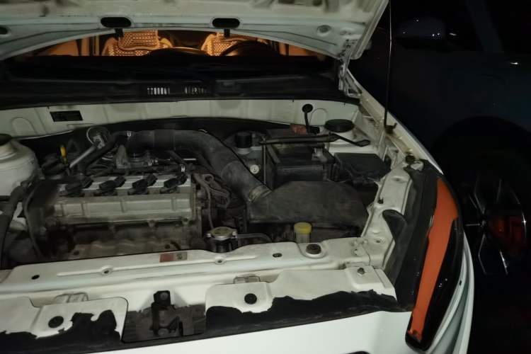 Used Oley 2012 Sedan 1.5L Manual Comfort Model Engine Bay Left