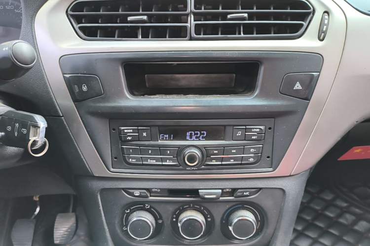Used Peugeot 301 2014 1.6L Manual Comfort Edition CNG Audio And AC Panel