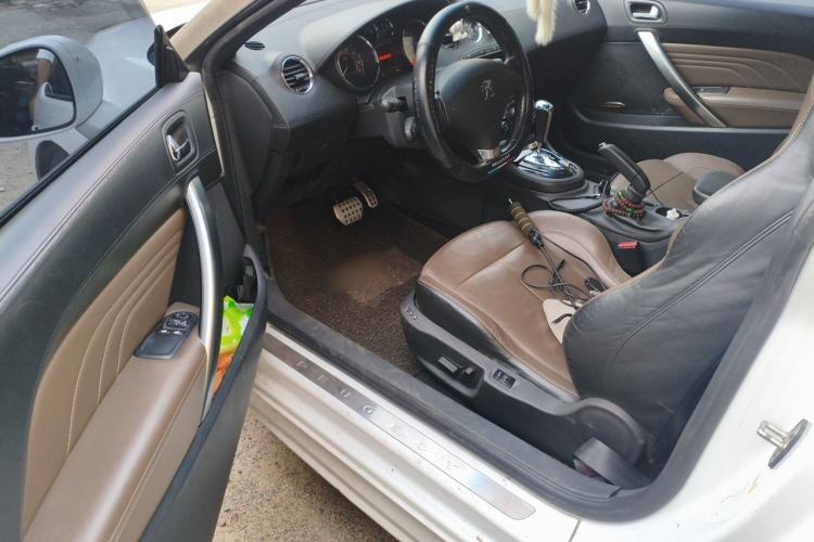 Used Peugeot RCZ 2014 1.6T Luxury Edition in a Light-Colored Style Driver Seat