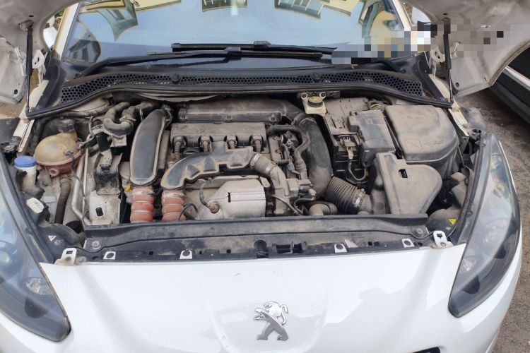 Used Peugeot RCZ 2014 1.6T Luxury Edition in a Light-Colored Style Engine Bay