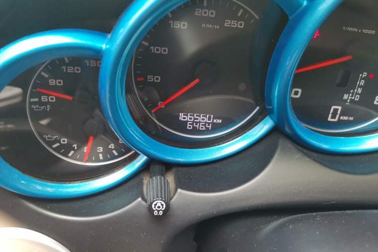 Used Porsche Cayman  Odometer Close Up