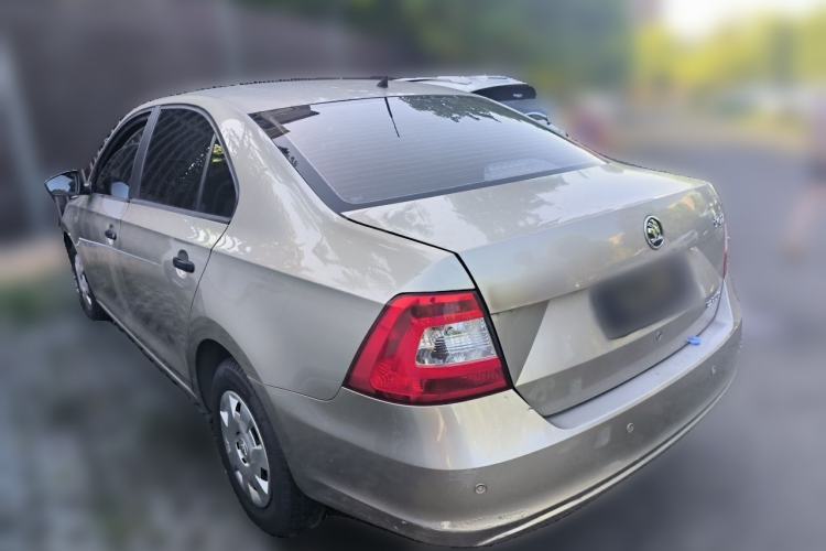 Used Skoda Rapid 2013 1.6L Manual Enjoyment Model Rear Left 45 Deg