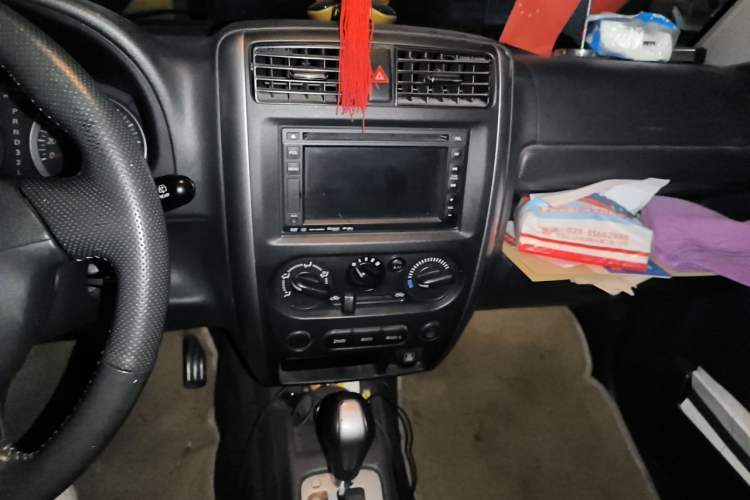 Used Suzuki Jimny 2011 1.3 MT Two-Tone Navigation Edition Audio And AC Panel