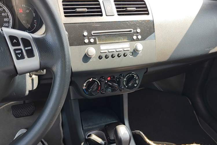 Used Suzuki Swift 2008 1.5L Automatic – Ultra-Stylish Xuanrui Edition Audio And AC Panel