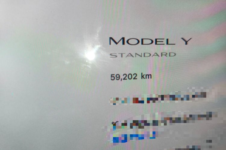 Used Tesla Model Y 2021 Standard Range Rear-Wheel Drive Version Odometer Close Up