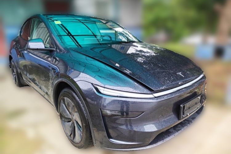 Used Tesla Model Y 2025 Long-Range All-Wheel Drive First Edition Front Right 45 Deg