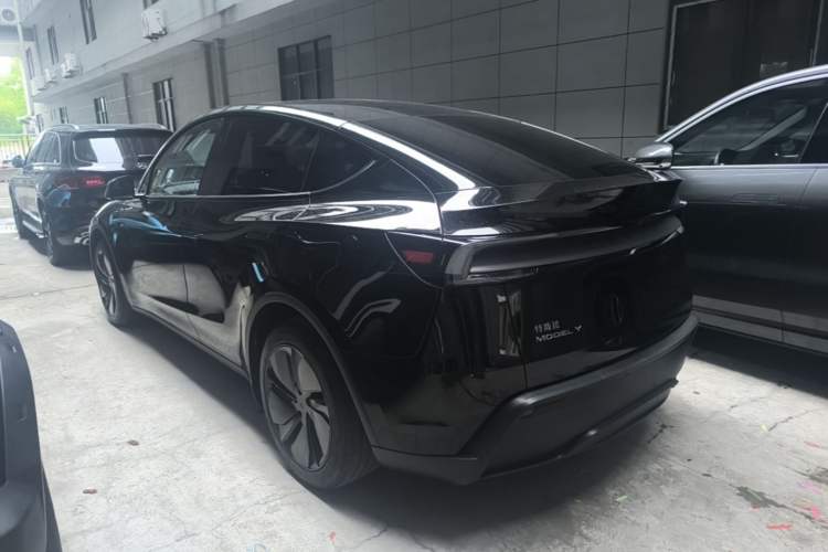 Used Tesla Model Y 2025 Rear-Wheel Drive First Edition Rear Left 45 Deg