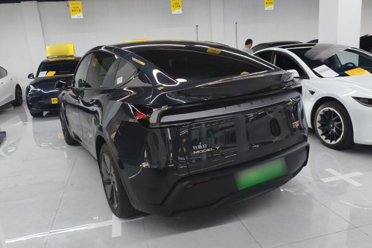 Used Tesla Model Y 2025 Rear-Wheel Drive First Edition Rear Left 45 Deg