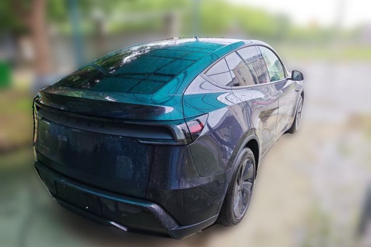 Used Tesla Model Y 2025 Long-Range All-Wheel Drive First Edition Rear Right 45 Deg