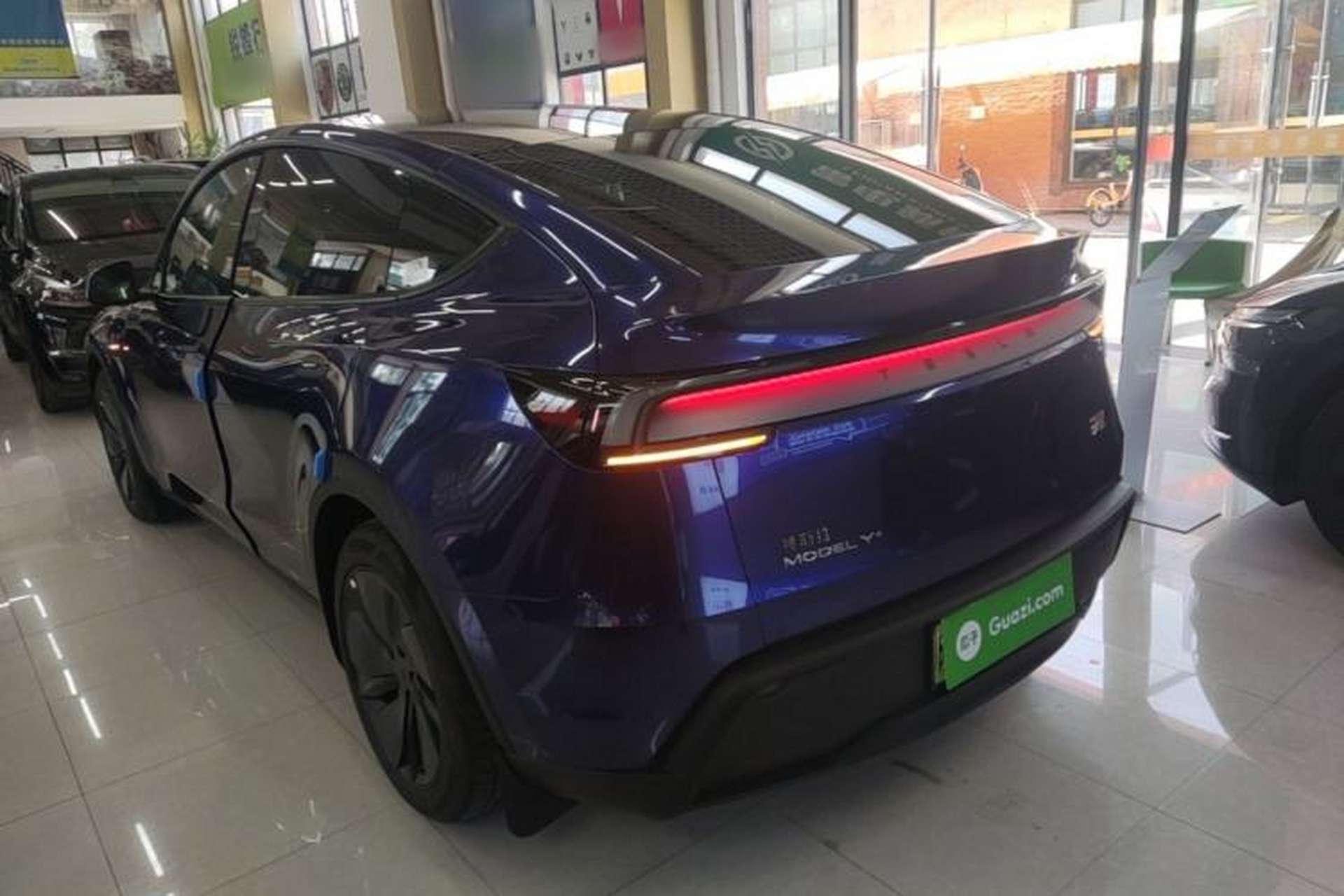 Used Tesla Model Y 2025 Long-Range All-Wheel Drive First Edition Rear Left 45 Deg