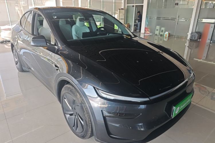 Used Tesla Model Y 2025 Long-Range All-Wheel Drive First Edition Front Right 45 Deg