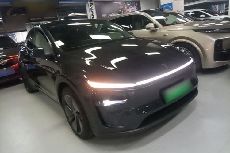 Used Tesla Model Y 2025 Long-Range All-Wheel Drive First Edition Front Right 45 Deg