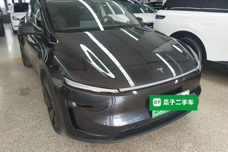 Used Tesla Model Y 2025 Long-Range All-Wheel Drive First Edition Front Right 45 Deg