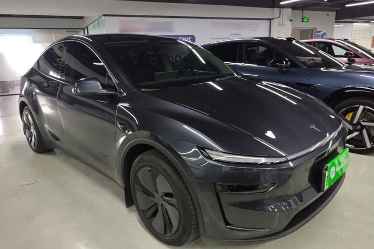 Used Tesla Model Y 2025 Long-Range All-Wheel Drive First Edition Front Right 45 Deg