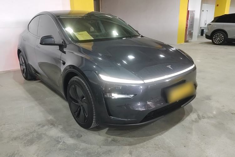 Used Tesla Model Y 2025 Long-Range All-Wheel Drive First Edition Front Right 45 Deg
