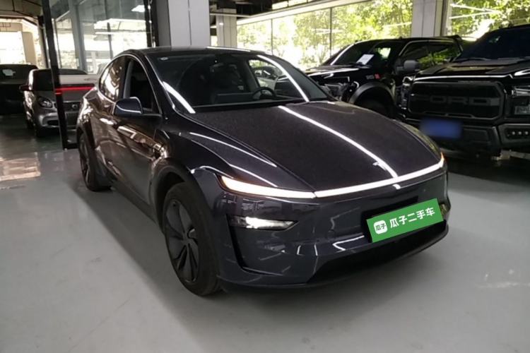 Used Tesla Model Y 2025 Rear-Wheel Drive First Edition Front Right 45 Deg