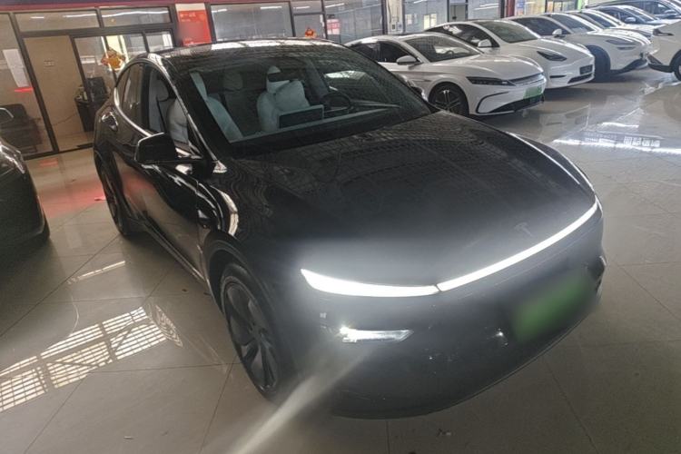 Used Tesla Model Y 2025 Long-Range All-Wheel Drive First Edition Front Right 45 Deg
