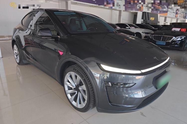 Used Tesla Model Y 2025 Long-Range All-Wheel Drive First Edition Front Right 45 Deg