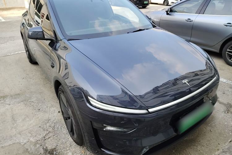 Used Tesla Model Y 2025 Long-Range All-Wheel Drive First Edition Front Right 45 Deg
