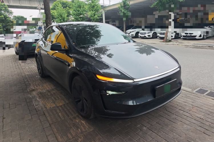Used Tesla Model Y 2025 Long-Range All-Wheel Drive First Edition Front Right 45 Deg