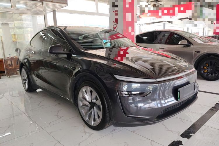 Used Tesla Model Y 2025 Long-Range All-Wheel Drive First Edition Front Right 45 Deg