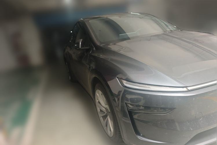 Used Tesla Model Y 2025 Long-Range All-Wheel Drive First Edition Front Right 45 Deg