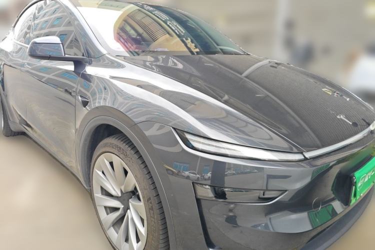 Used Tesla Model Y 2025 Long-Range All-Wheel Drive First Edition Front Right 45 Deg