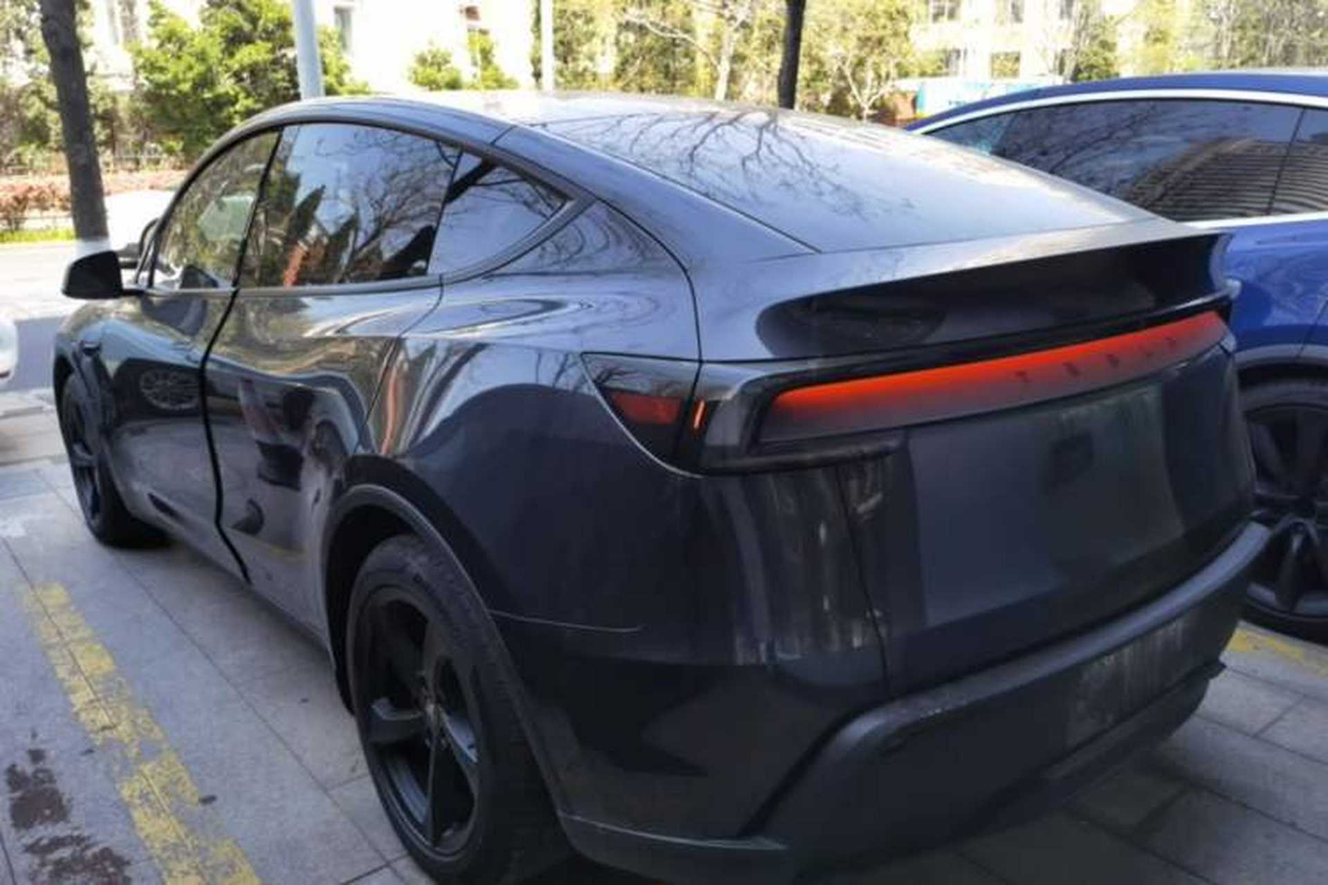 Used Tesla Model Y 2025 Long-Range All-Wheel Drive First Edition Rear Left 45 Deg