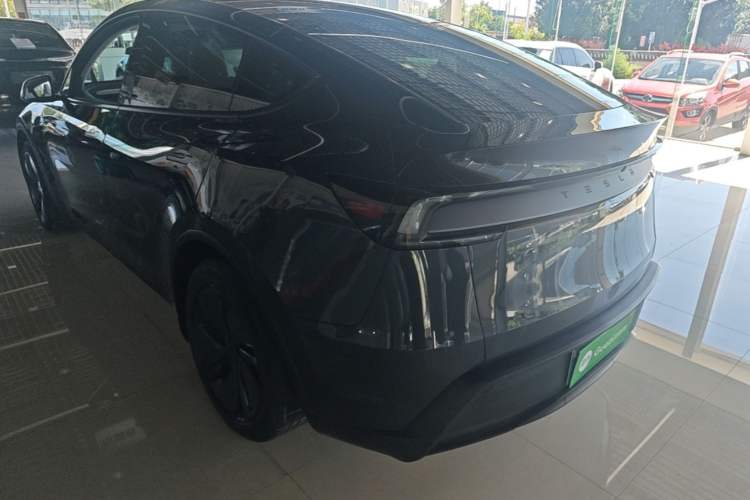 Used Tesla Model Y 2025 Long-Range All-Wheel Drive First Edition Rear Left 45 Deg