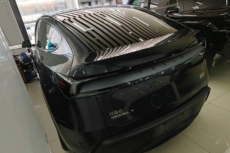 Used Tesla Model Y 2025 Rear-Wheel Drive First Edition Rear Left 45 Deg
