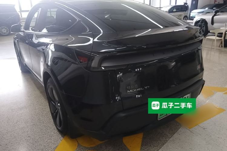 Used Tesla Model Y 2025 Long-Range All-Wheel Drive First Edition Rear Left 45 Deg