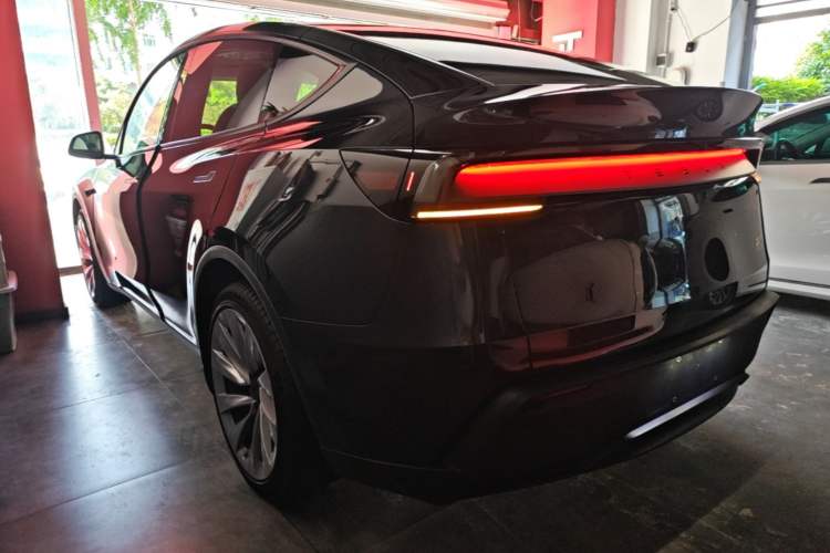 Used Tesla Model Y 2025 Long-Range All-Wheel Drive First Edition Rear Left 45 Deg