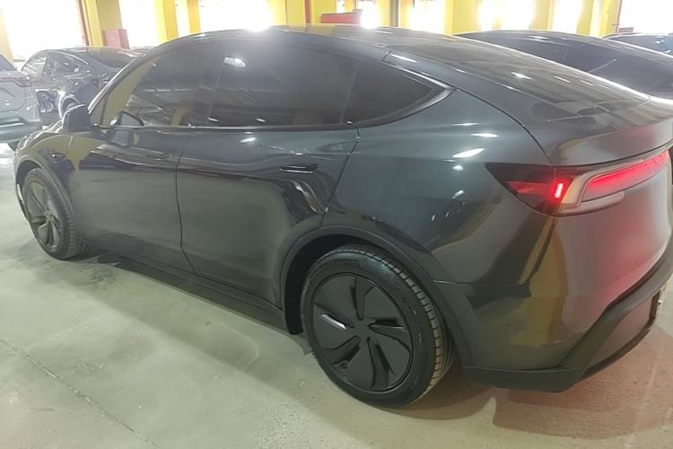 Used Tesla Model Y 2025 Long-Range All-Wheel Drive First Edition Rear Left 45 Deg